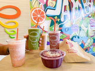 jamba juice smoothie and food on table in store