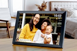 Lifestyle image of the Proscan Elite Wi-Fi Digital Picture Frame in bedroom setting