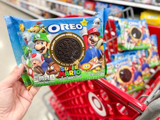 Someone putting some Super Mario Oreos in a Target cart