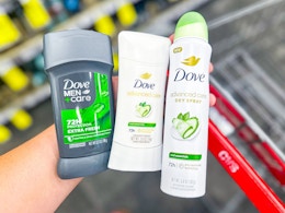 hand holding dove deodorants