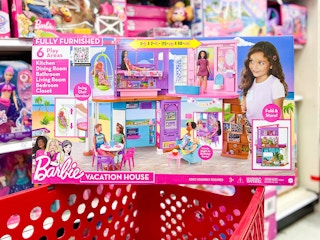 barbie vacation house sitting on top a target cart