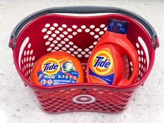 tide pods and laundry detergent in a target basket