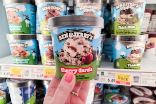 hand holding ben and jerrys ice cream pint at kroger