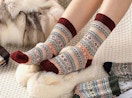 a person wearing a pair of wool socks 