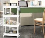 a slim 4-tier cart next to a desk