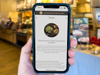 The Panera promo code and coupon page open on a cell phone