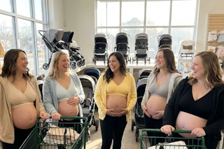 women shopping at a baby supply store