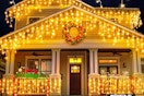 icicle lights hanging on front of house