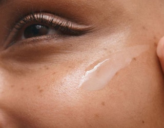 dark spot serum on a face