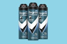 three cans of deodorant spray
