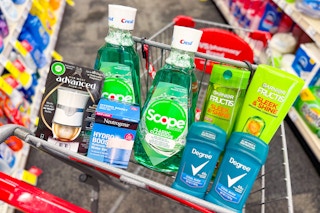 air wick warmer, neutrogena moisturizer, degree deodorant, garnier shampoo, and scope mouthwash in a cart