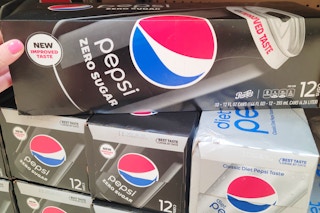 hand touching a pepsi zero sugar soda 12 pack