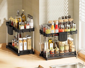 two 2-tier organizers with seasonings and oils on them 