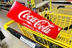 coca-cola 12-pack in a shopping cart