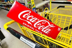 coca-cola 12-pack in a shopping cart