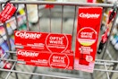 3 colgate toothpastes in a cart