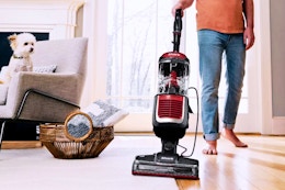 Lifestyle image of the Shark Navigator Swivel Pro Upright Vacuum in home setting