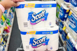 two scott toilet paper packs in a shopping cart