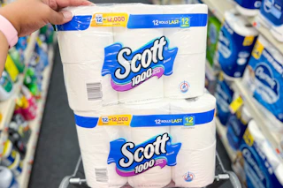 two scott toilet paper packs in a shopping cart