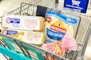 shopping cart with egglands best eggs and mission tortillas