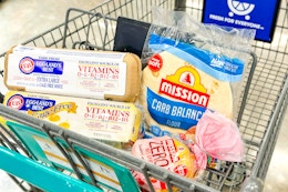 shopping cart with egglands best eggs and mission tortillas