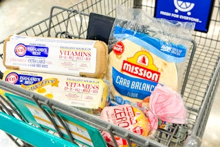 shopping cart with egglands best eggs and mission tortillas