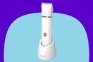 OLOV Electric Body Hair Trimmer on a blue background.