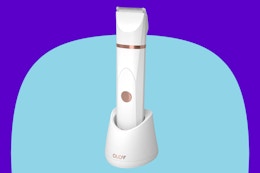 OLOV Electric Body Hair Trimmer on a blue background.