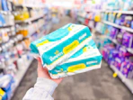 hand holding pampers wipes in cvs