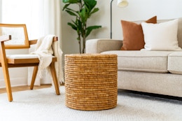 Buy This Woven Storage Ottoman for Under $50 at Target card image