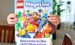 lego magazine being held out by a kid
