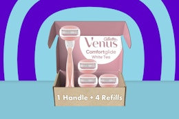 a gillette venus razor gift set on a blue background