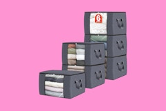 fabric storage bins on a pink background