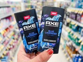 hand holding axe deodorant