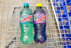 mtn dew soda bottles in shopping cart