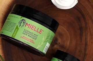 A hair mask on a tree stump