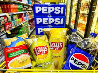 soda, chips, and soup in a cart