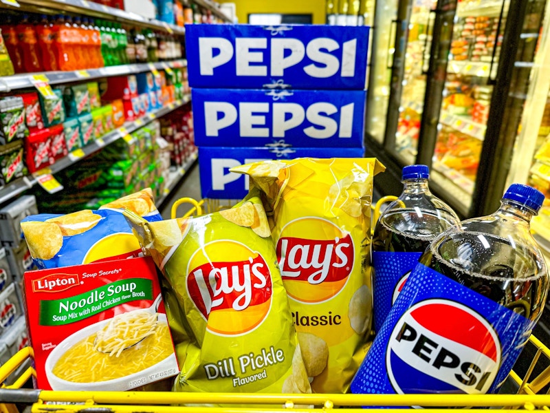 soda, chips, and soup in a cart