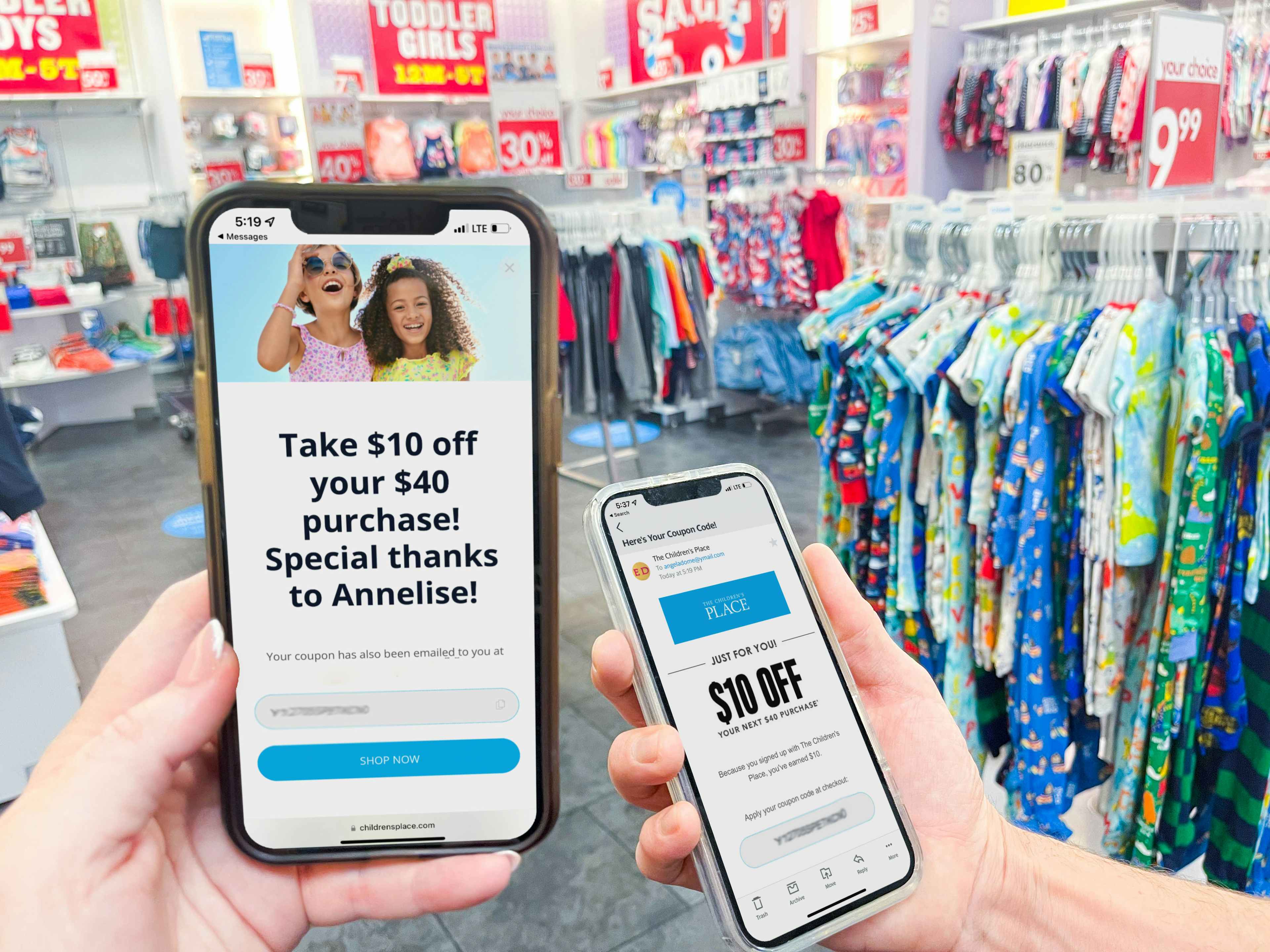 two people holding cellphones in store with email coupons