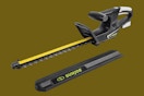 a sun joe hedge trimmer on a green background