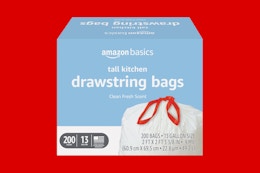 amazon basics trash bags on a red background
