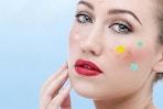 Woman wearing star pimple patches. B0CDH47BN9