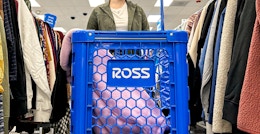 a person pushing a cart in ross
