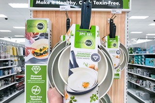 GreenPan 3-Piece Set held up in front of end cap display at Target