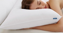 a person laying on a pillow