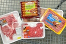 johnsonville sausage, chicken, ground beef, and pork chops together in shopping cart