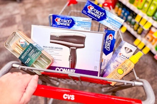 cvs shopping cart with ecotools, conair, crest, and sun bum products