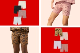 Stock images of the Little Star Organic Girls 4 Pk Bike Shorts in multiple prints