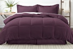 Lifestyle image of the purple Ienjoy comforter set in purple displayed on bed