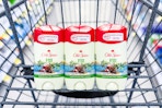 3 old spice deodorants in a cart